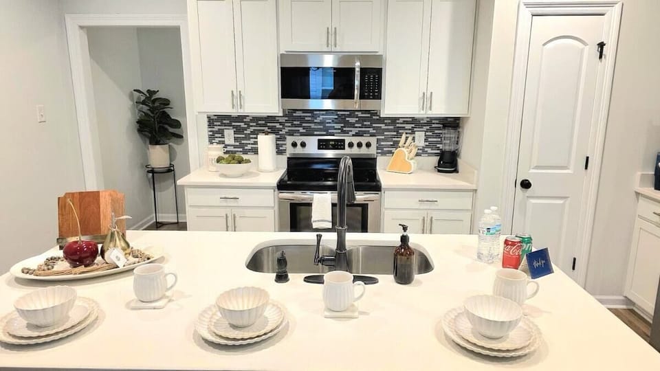 Kitchen Island Offers Extra Seating For Your Guests 