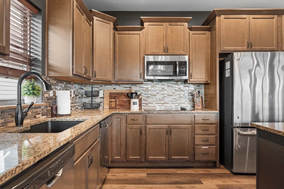 The cabinets are full of all the cookware needed to make your favorite meals!