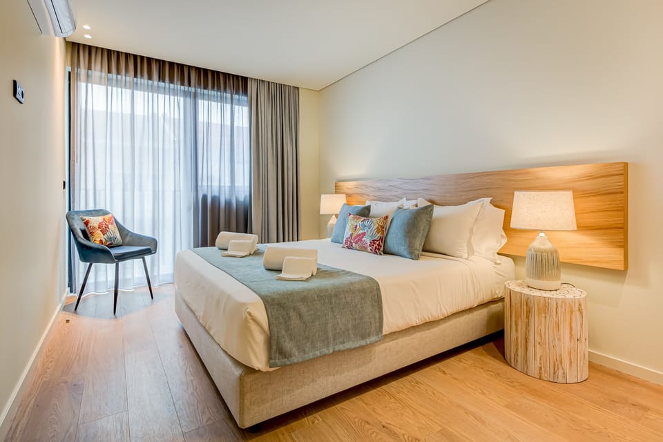 Premium bedding, down comforters, blackout drapes, soundproofing