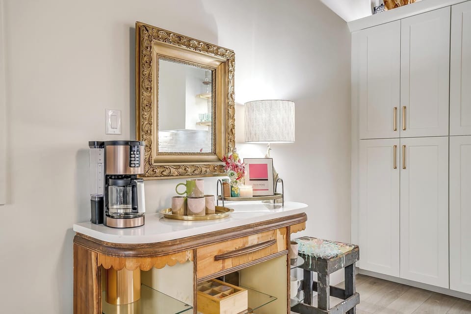 A vintage coffee bar with a gold mirror and enough charm to make your morning routine feel like part of the experience. The details at The Noir are the kind you notice and remember long after you leave Lake Granbury.
