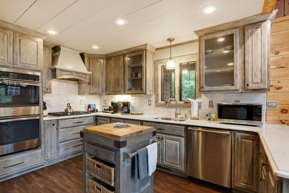 Beautful custom kitchen, stocked with applicance, pots, pans, utensils, etc., so you can cook for friends and family.