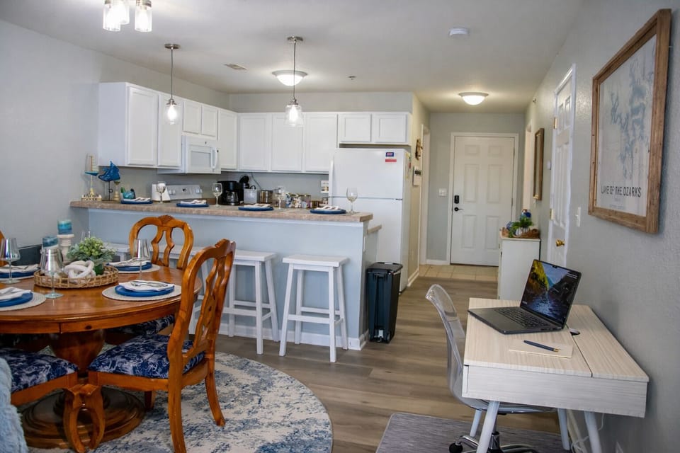 Open kitchen and entryway with easy access to living areas