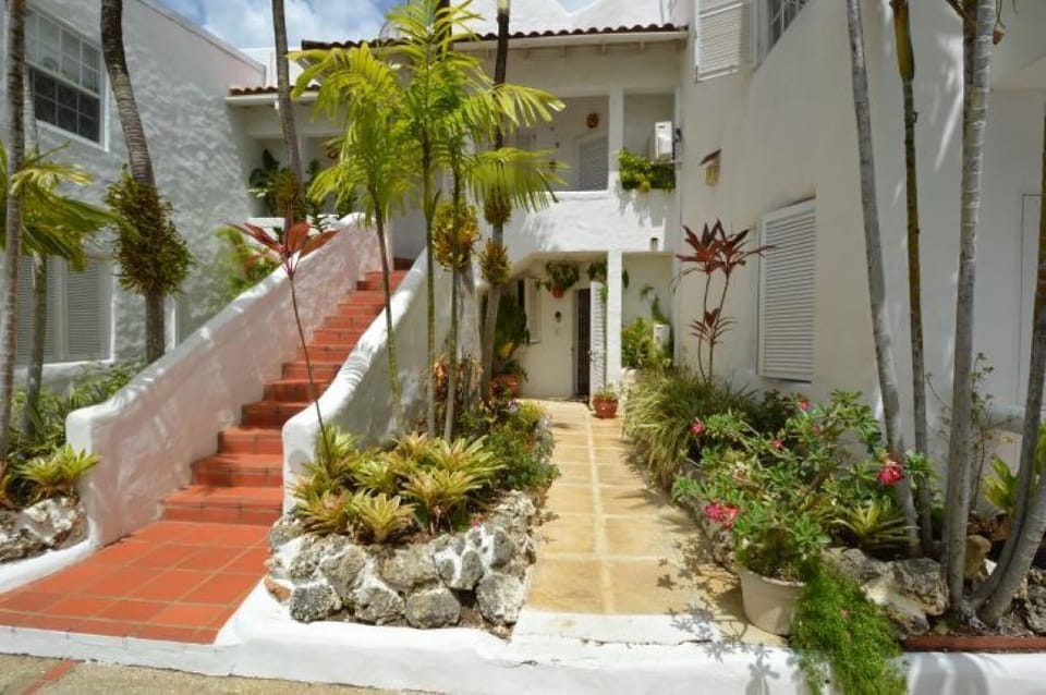 Pretty downstairs front entrance on the right, to condo number 1.