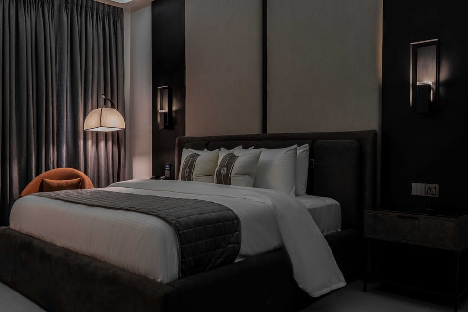 Deluxe Suite | Living area | Flat-screen TV