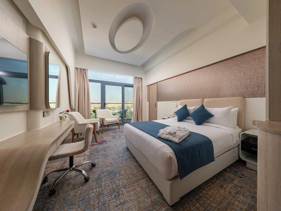 Suite, 1 Bedroom, Balcony | Minibar, desk, laptop workspace, free WiFi