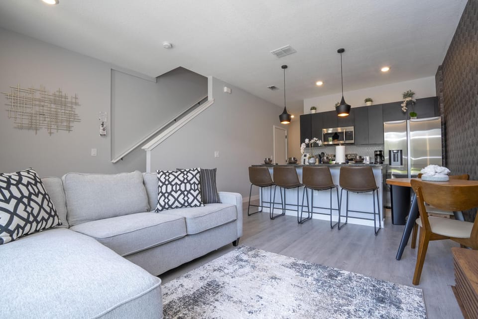 Living Room + Kitchen + Stairs to the 2nd Floor
