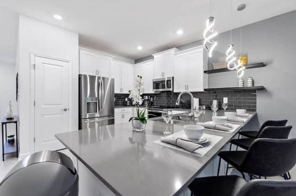 Kitchen Island That Seats 4 People with Kitchen In The Background