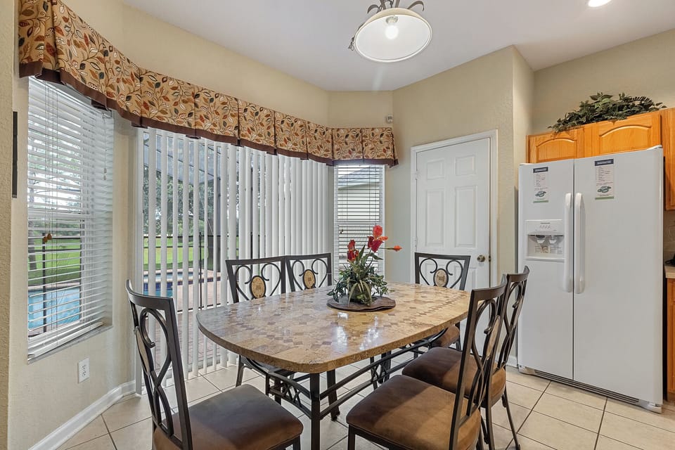 Breakfast Area That Seats 6 People In Kitchen With Pool Access