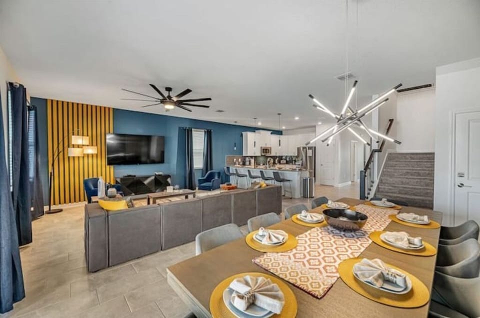 View of Living Room, Dining Area, Kitchen & Stairs to Second Floor