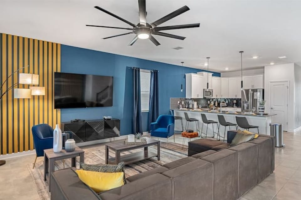Living Room with TV & Kitchen in Back Ground
