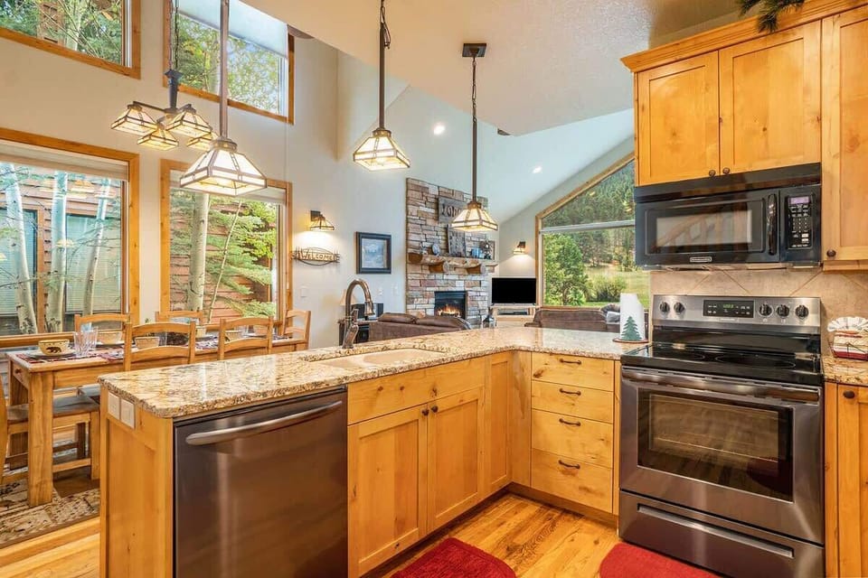Open concept kitchen, dining, and living area
