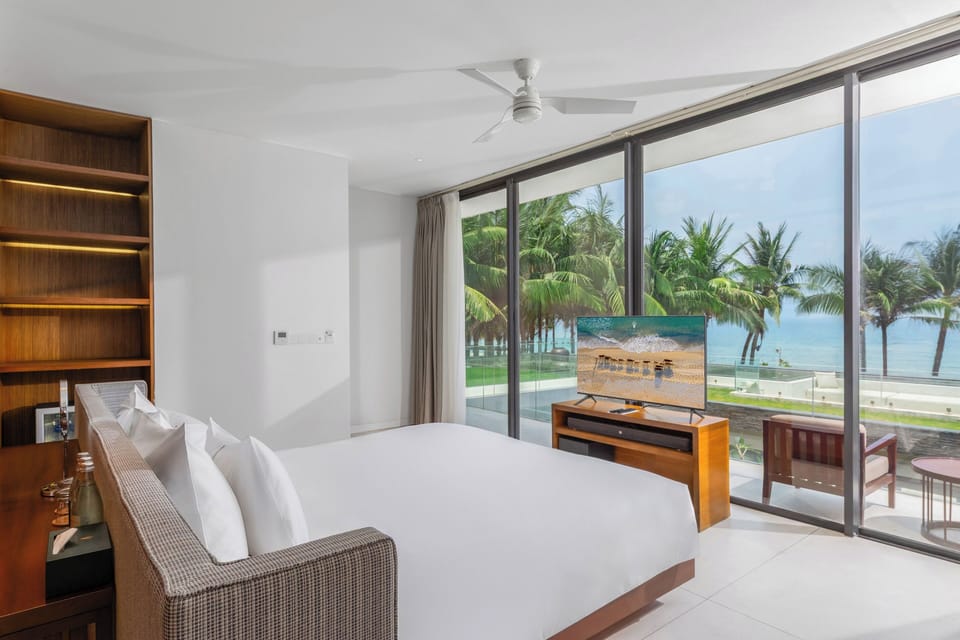 Beachfront Three-Bedroom Pool Villa (Spa Inclusive) | Minibar, in-room safe, desk, laptop workspace