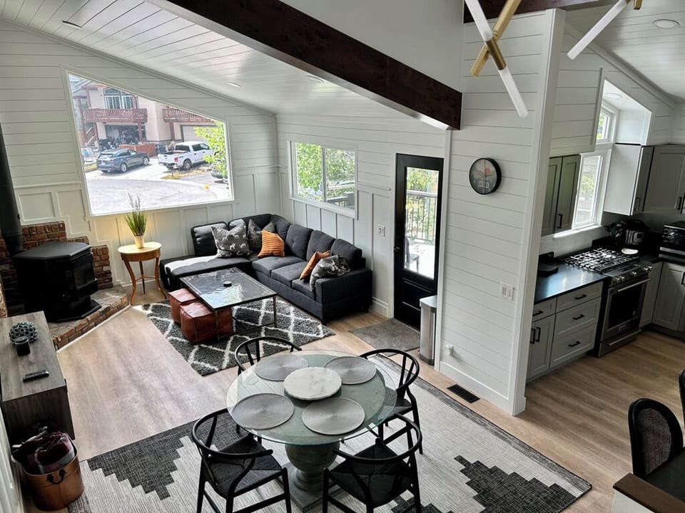 Great room showing living room, dining area and kitchen