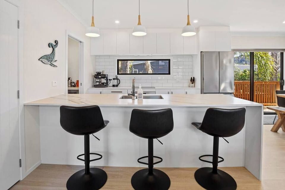 Modern kitchen with breakfast bar.