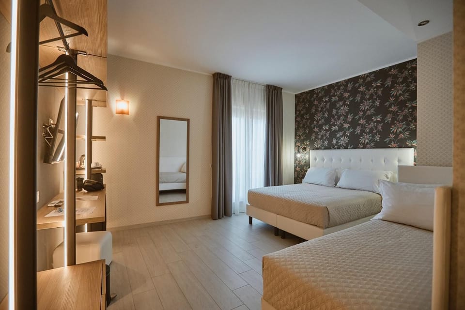 Deluxe Triple Room | Premium bedding, down comforters, in-room safe, desk