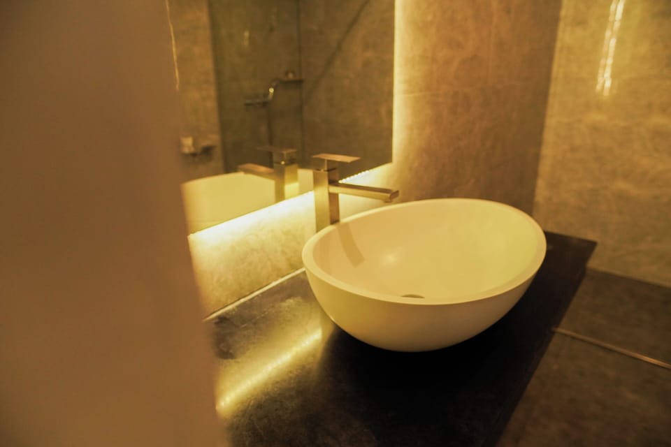 Suite, 1 Bedroom | Bathroom | Shower, rainfall showerhead, slippers, bidet