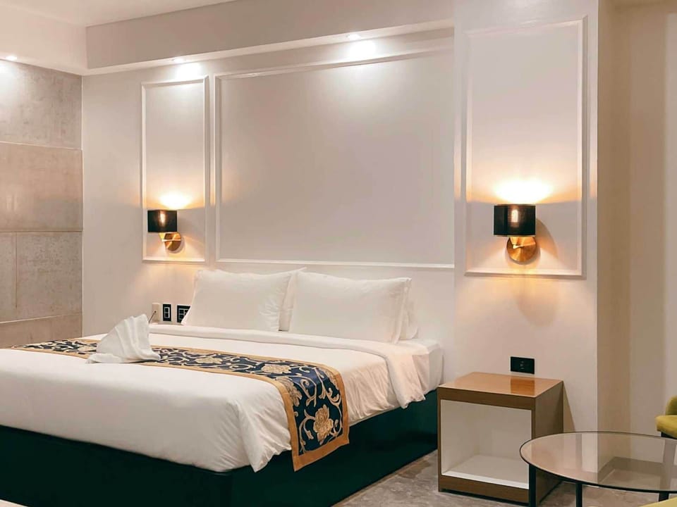 Deluxe Double Room | Premium bedding, in-room safe, laptop workspace, blackout drapes