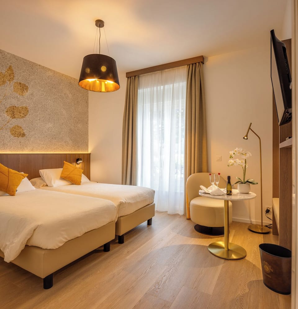Premium bedding, down comforters, minibar, in-room safe