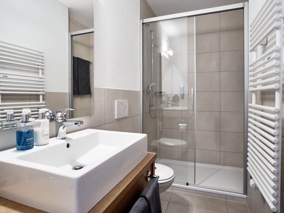 Double Room (medium) | Bathroom | Shower, hair dryer, towels