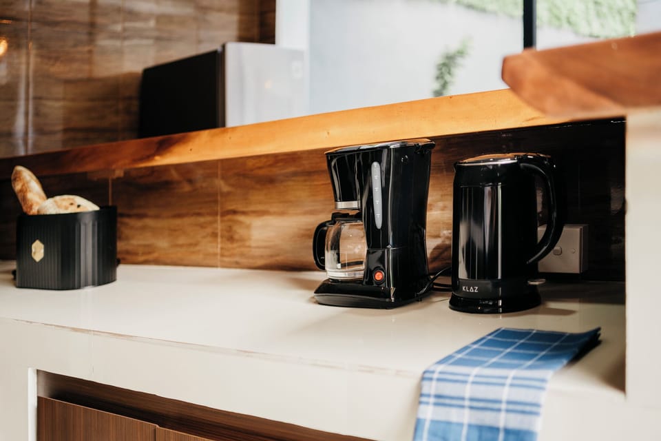 Deluxe Villa | Private kitchen | Fridge, microwave, stovetop, dishwasher
