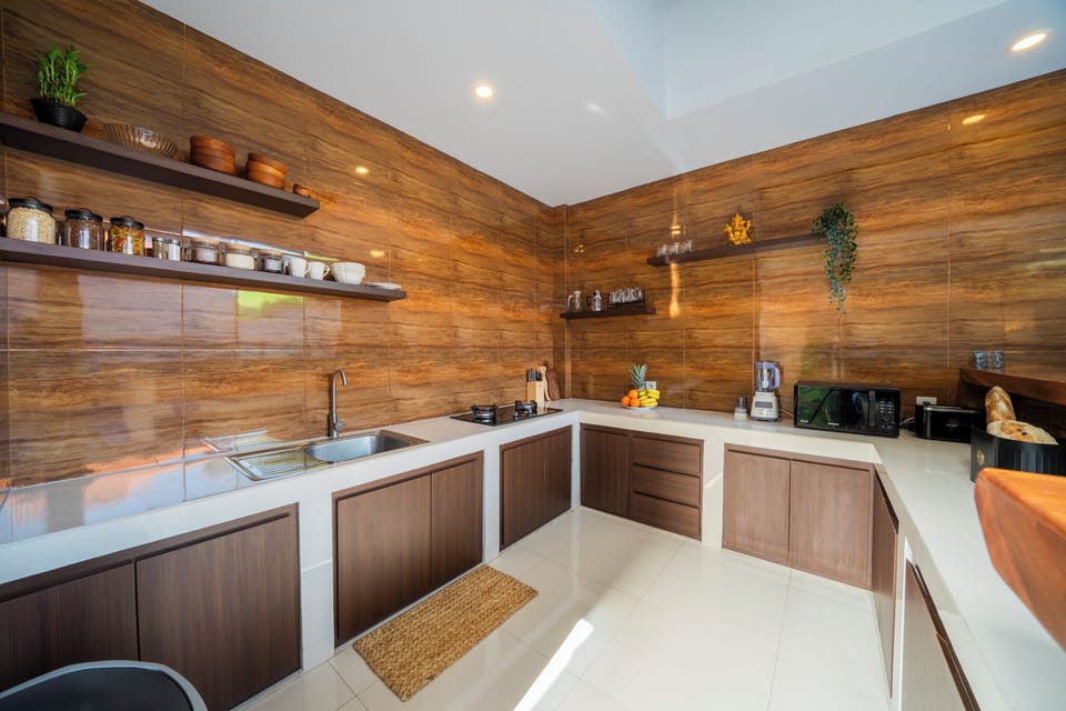 Deluxe Villa | Private kitchen | Fridge, microwave, stovetop, dishwasher