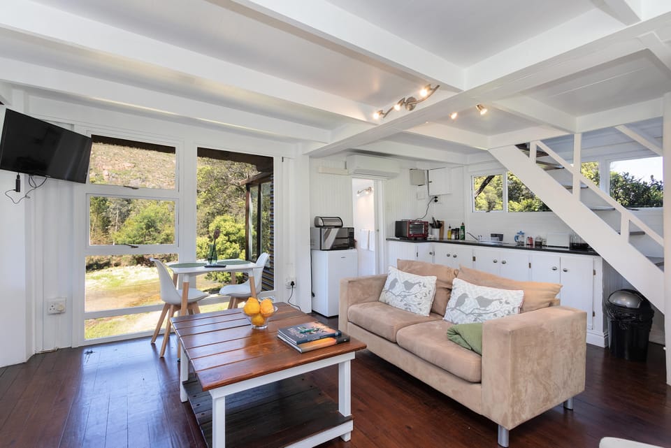 Deluxe Cabin | Living area | TV