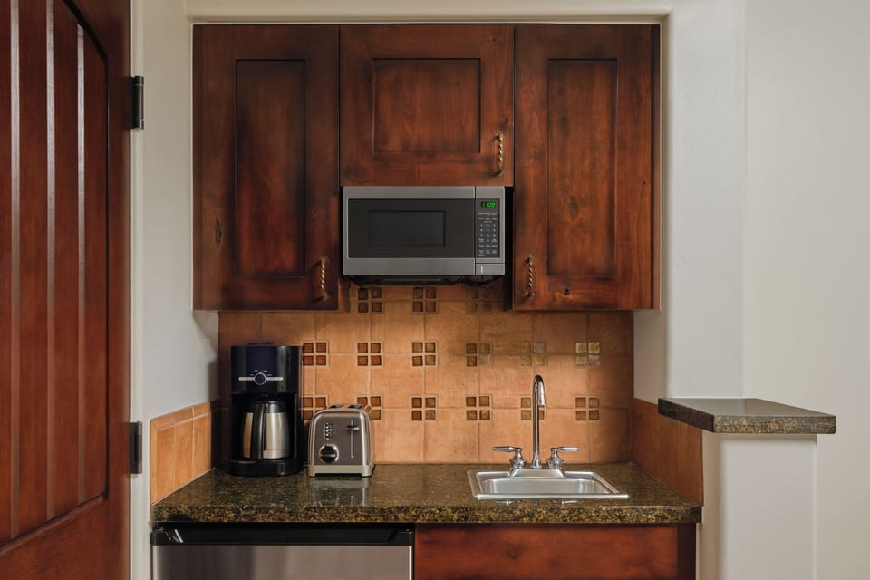 Microwave, coffee/tea maker, toaster, cookware/dishes/utensils