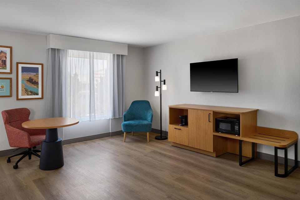 In-room safe, desk, iron/ironing board, cribs (free)