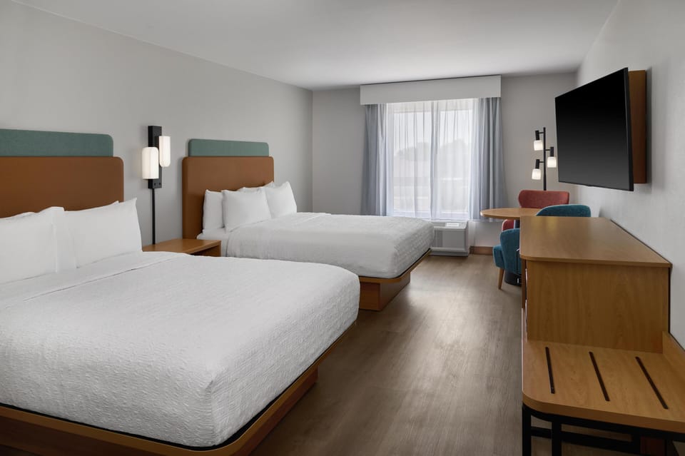 In-room safe, desk, iron/ironing board, cribs (free)