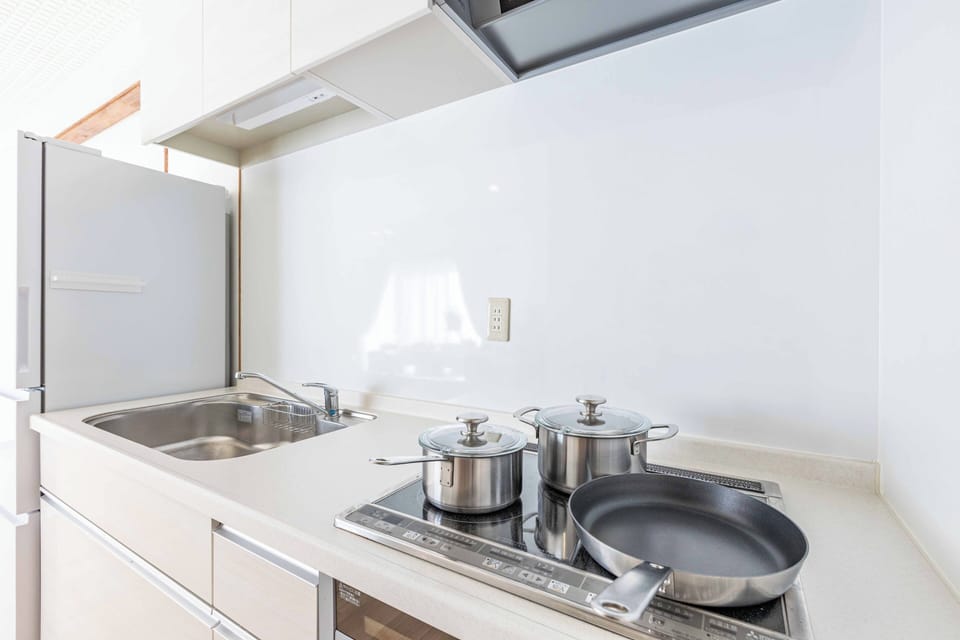 Classic Condo | Private kitchen | Full-size fridge, microwave, stovetop, electric kettle