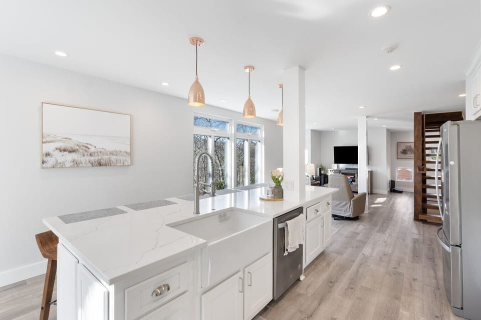 Large Island with Seating for Six. Our kitchen is stocked with all the conveniences of home.