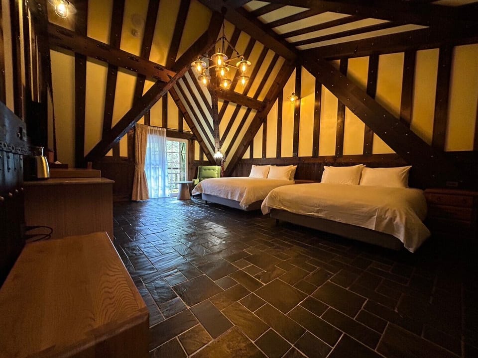 Classic Quadruple Room, 2 Queen Beds, Non Smoking, Mountain View | Minibar, laptop workspace, soundproofing, free WiFi