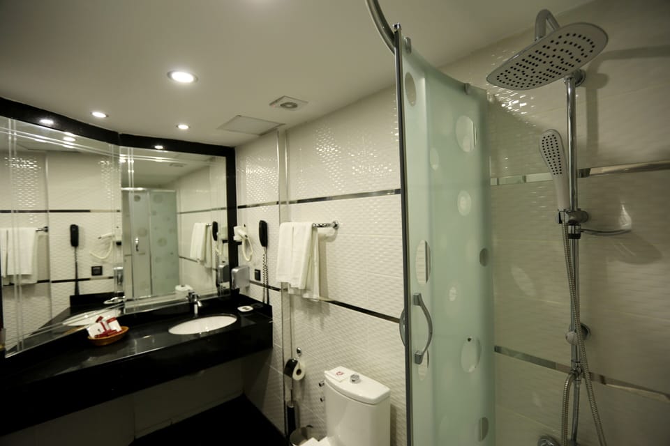 Shower, free toiletries, hair dryer, slippers