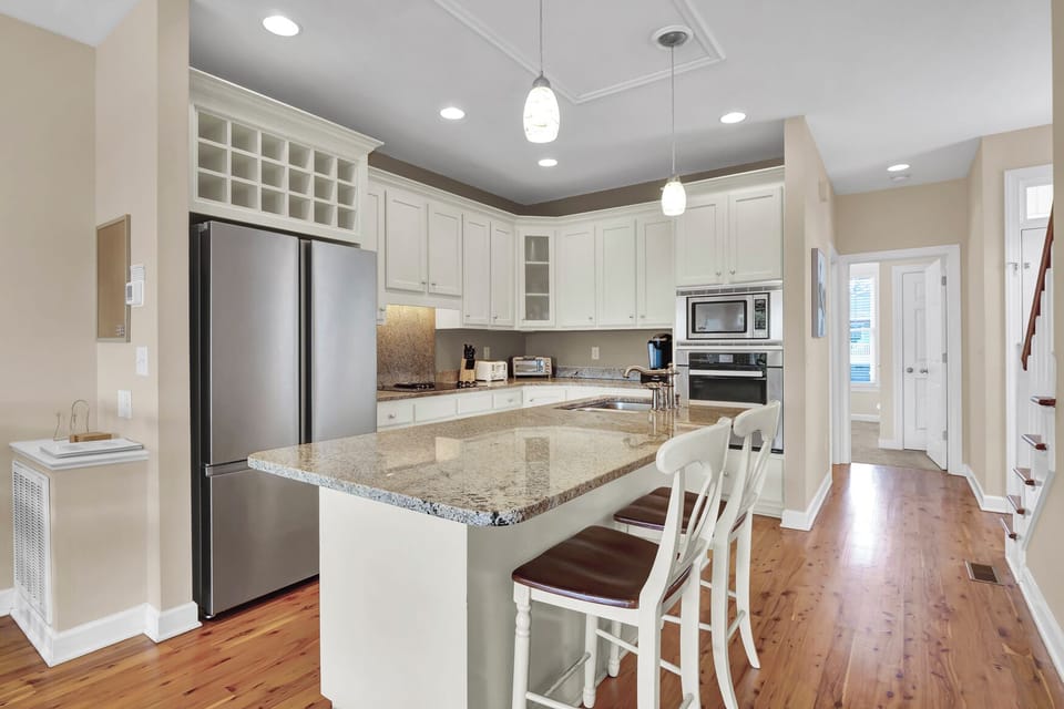 Unit 1 - Open floor plan with large kitchen island that provides additional seating