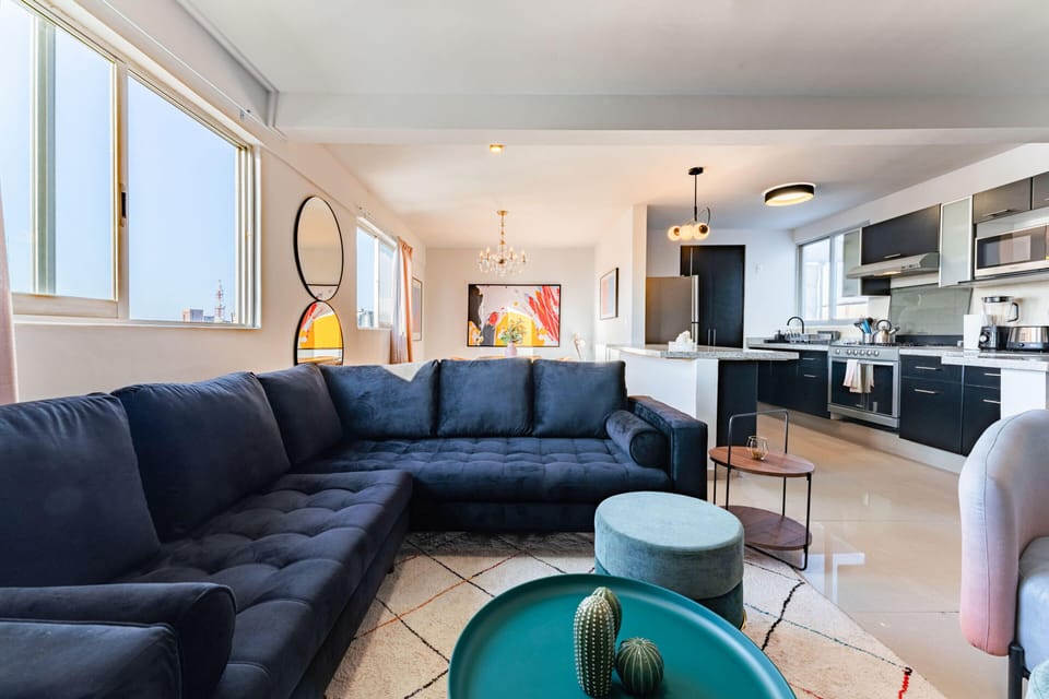 Gather around the spacious sofa and enjoy your favorite shows.