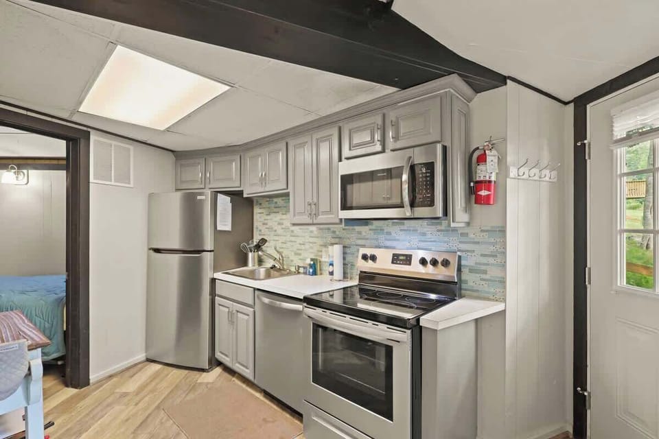 A fully equipped kitchen, ready to inspire your culinary adventures with modern appliances and amenities.