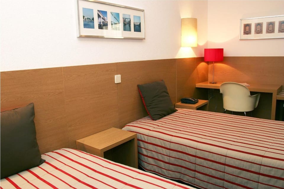 Double Room | Minibar, in-room safe, desk, laptop workspace