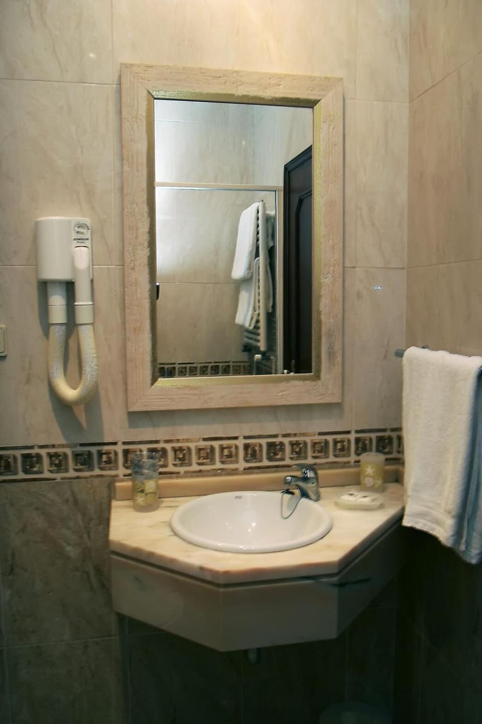 Hair dryer, towels, soap, toilet paper
