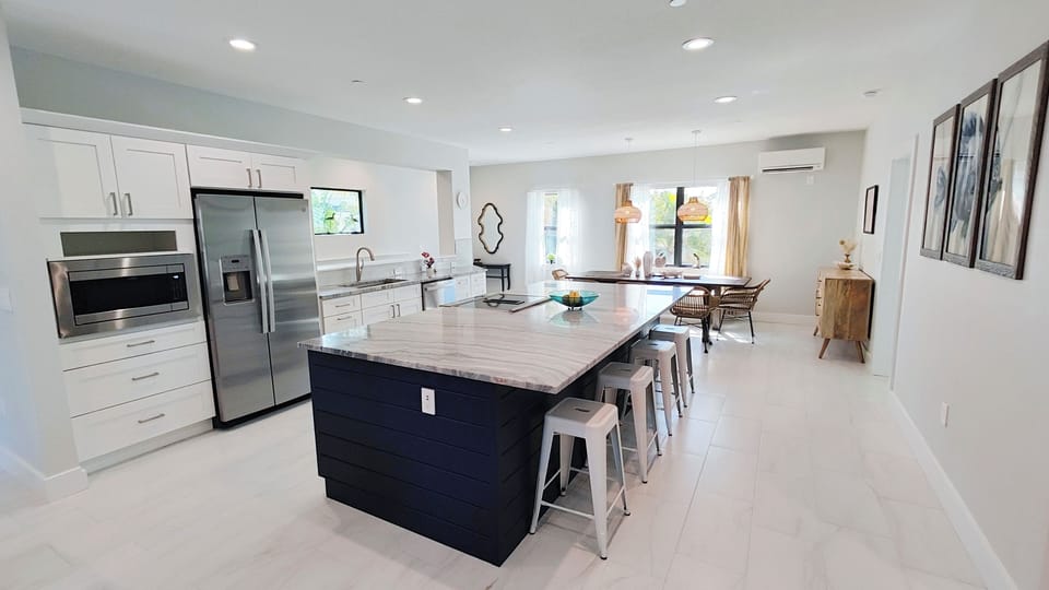 Kitchen features filtered water dispenser, range, oven, microwave, dishwasher...