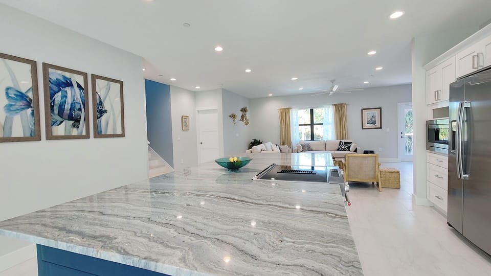 Open modern kitchen with 10ft island. 