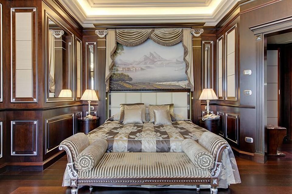 Junior Suite, with lake view | Minibar, in-room safe, individually furnished, desk