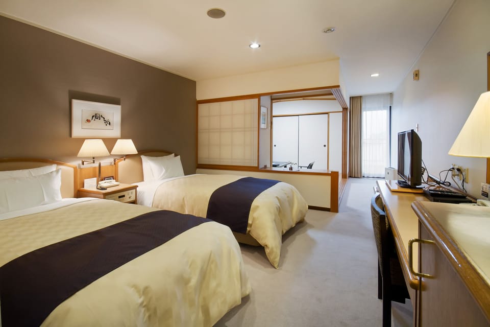 Japanese Western Style Room, Non-Smoking | Hypo-allergenic bedding available, down comforters, in-room safe