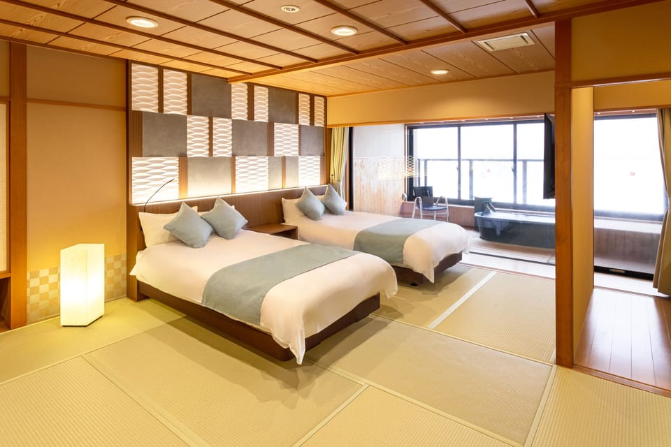 Japanese Western Style Room with Outdoor Bath, Non Smoking | In-room safe, bed sheets