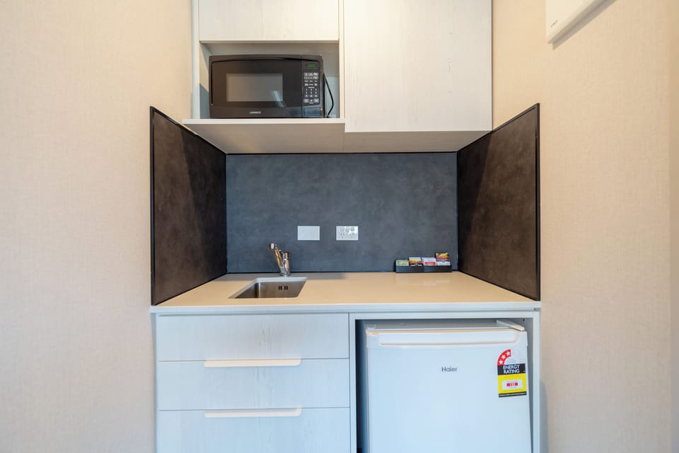 Superior Studio Suite | Private kitchen | Shared fridge, shared microwave