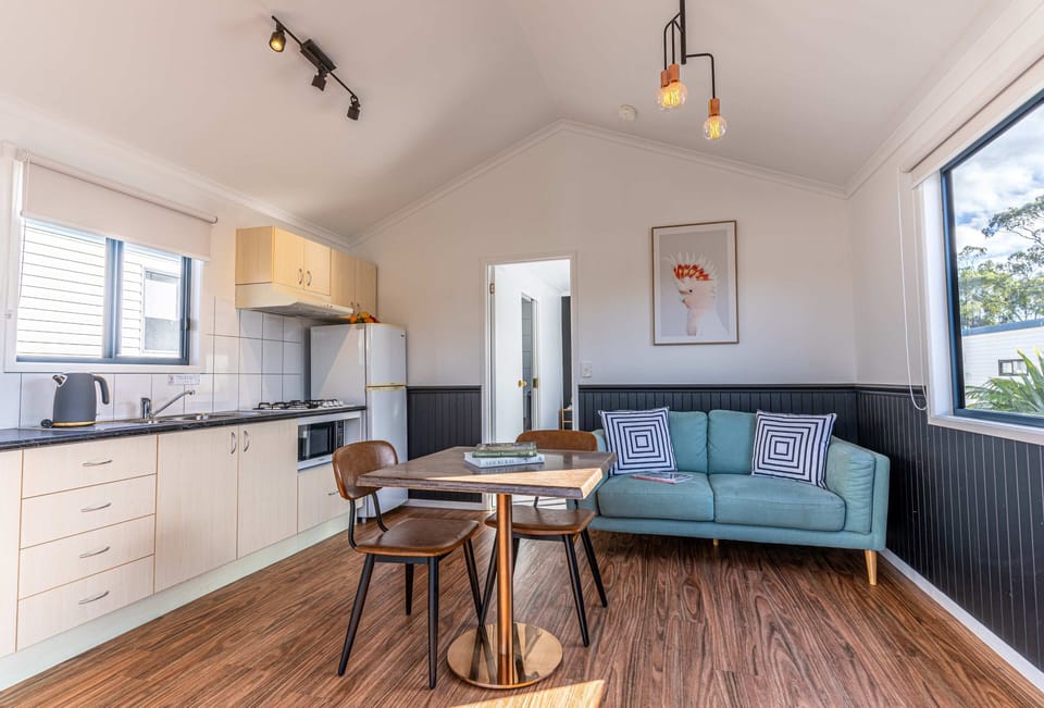 Studio Unit (Sleeps 2) | Living area | 20-inch flat-screen TV with digital channels, TV, table tennis