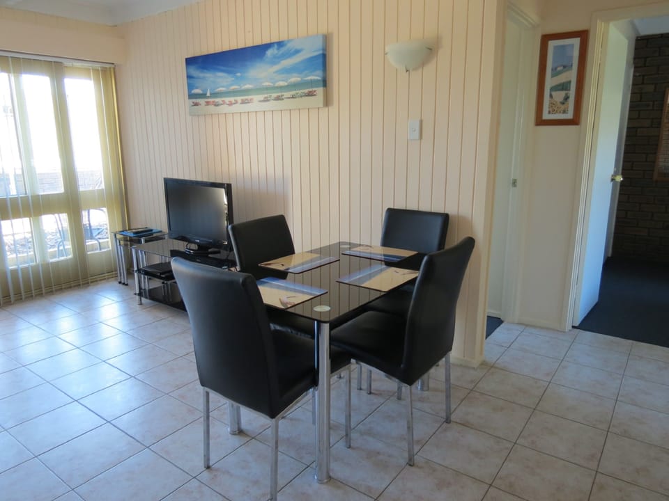 Standard Apartment, 2 Bedrooms, Non Smoking, Kitchen (Pool side) | Living area | 40-inch Smart TV with digital channels, DVD player