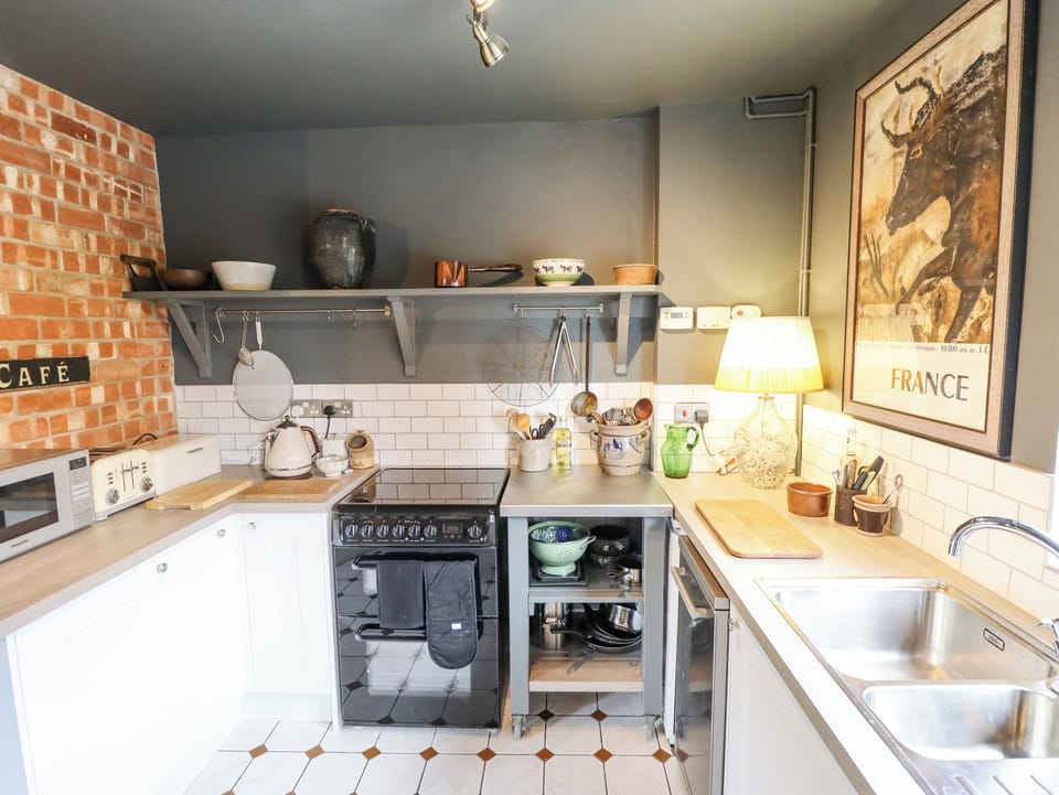 Fridge, dishwasher, electric kettle, cookware/dishes/utensils