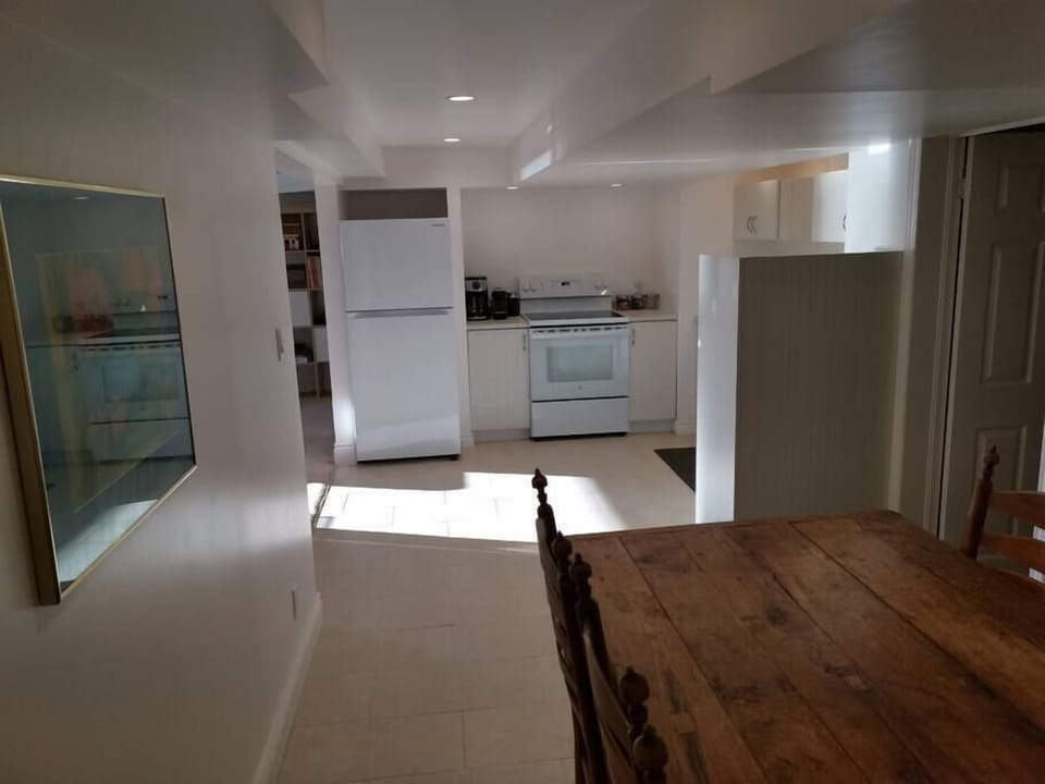 SkyView has a full kitchen and a dining table that can seat 6.