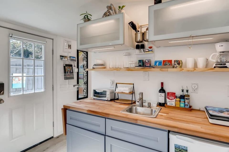 Cook dinner on the cook top and have coffee in the morning. Raise the end of the counter top for extra workspace. 