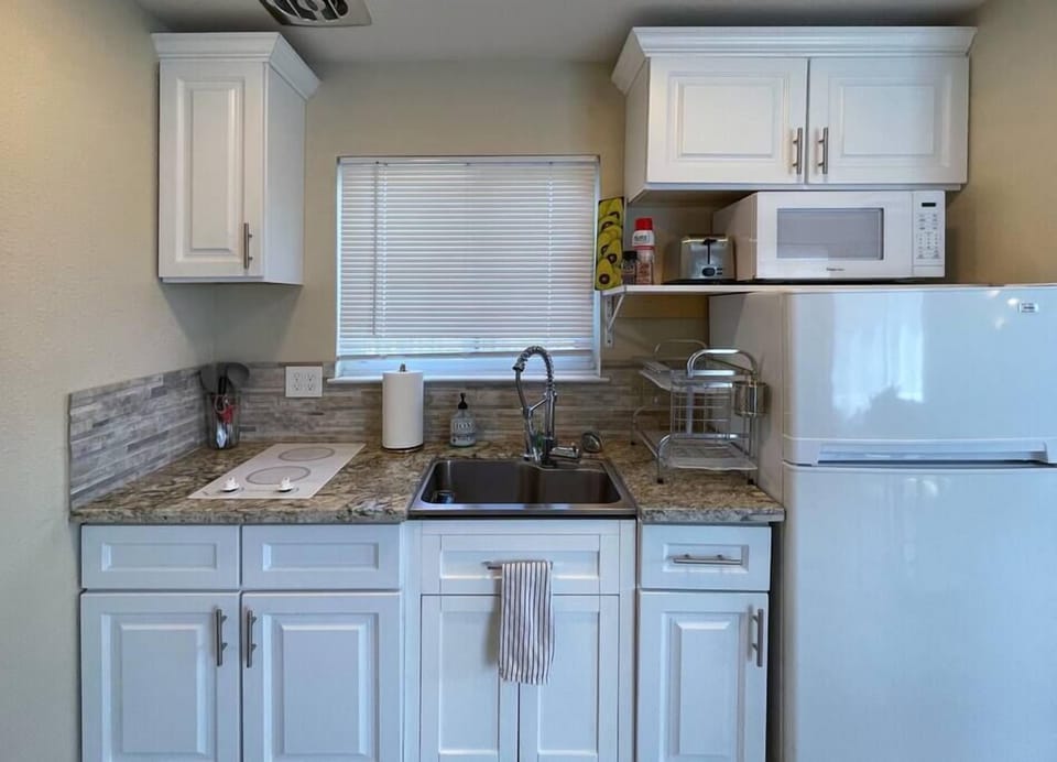 Great kitchen area with all of the essentials for two.